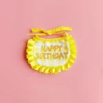 yellow bib
